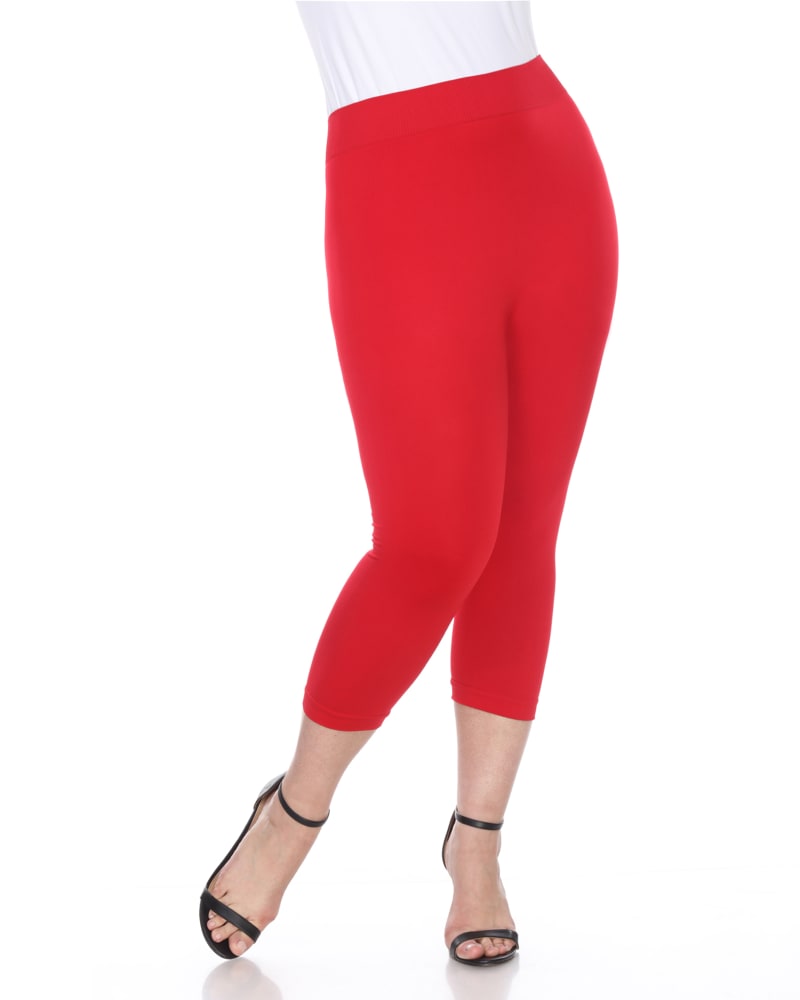 Front of a model wearing a size one-size-fits-all Super Soft Capri Leggings in Red by White Mark. | dia_product_style_image_id:249378